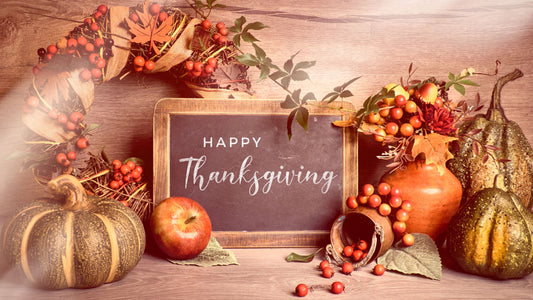 Pumpkins, Gourds and Fall Decor with a Chalkboard and Happy Thanksgiving Text